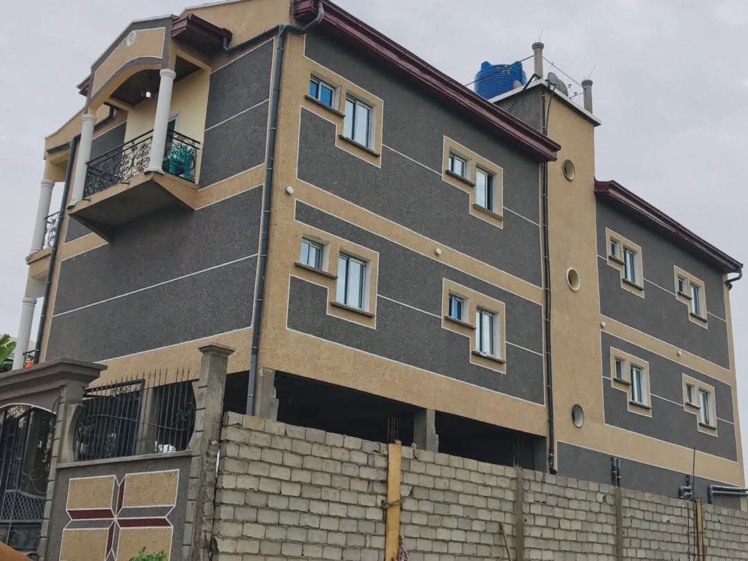 Video: Brown and grey granite finish on luxury home exterior